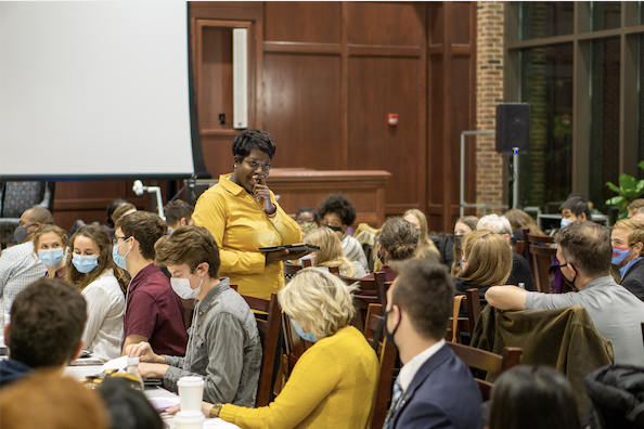 Toyinda Smith addresses students, faculty and staff participating in the Women's Leadership Series and Men's Leadership Series.