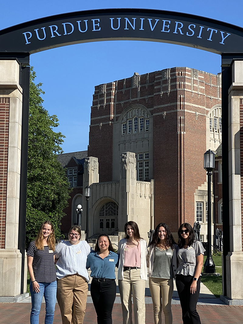 Dining & Culinary food service interns in front of the Purdue Memorial Union arch.