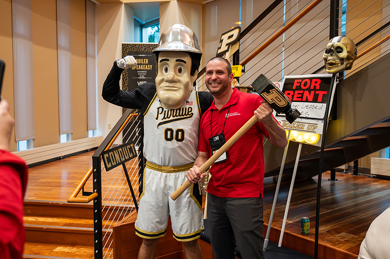 Purdue Pete with Residential Life guest at Big Ten Conference.