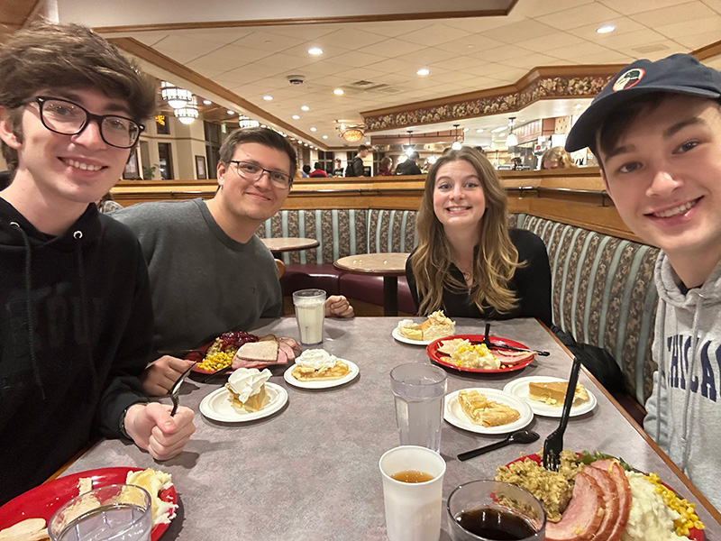 Student enjoy Thanksgiving meal