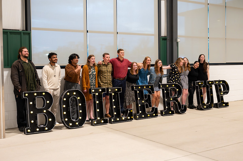 Students with Boiler Up sign at awards ceremony